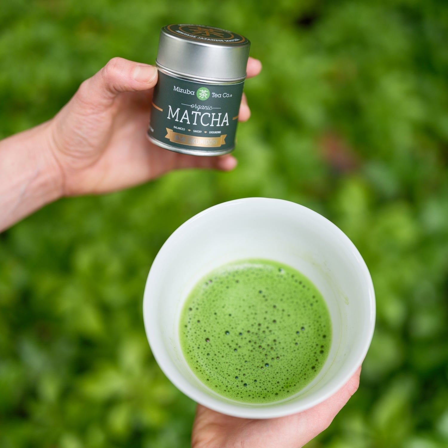 Mizuba Tea's Okumidori Matcha next to white bowl