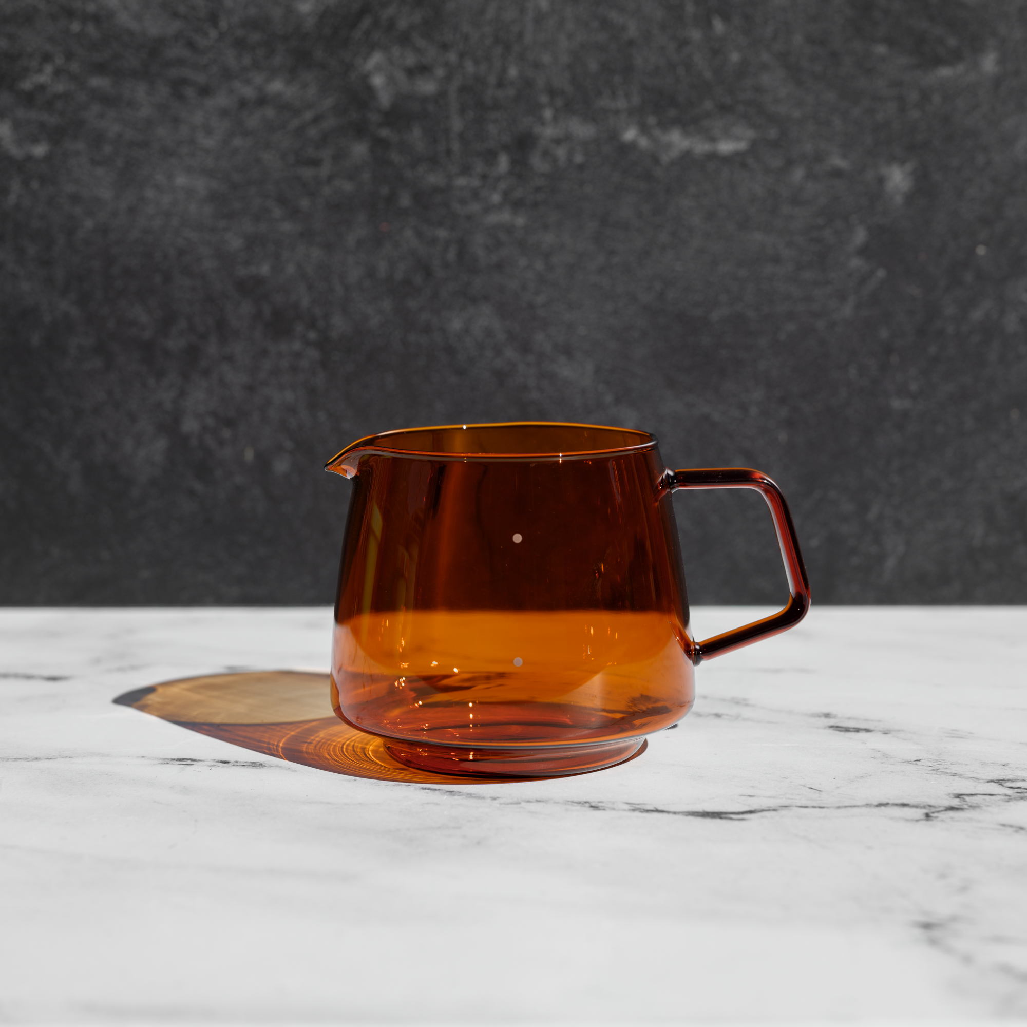 Tan glass tea cup