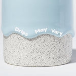 Drip ceramic tea cups with the wording 
"Drips May Vary"