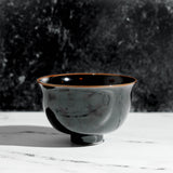 Black porcelain chawan matcha tea bowl on a table – Mizuba Tea Co. 